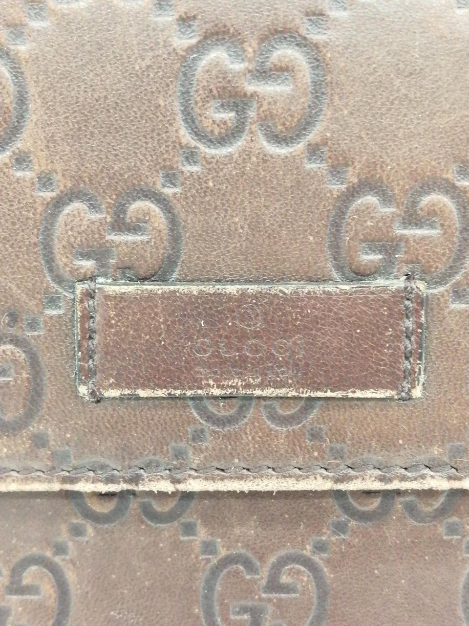 Gucci Brown Monogram Embossed Wallet!