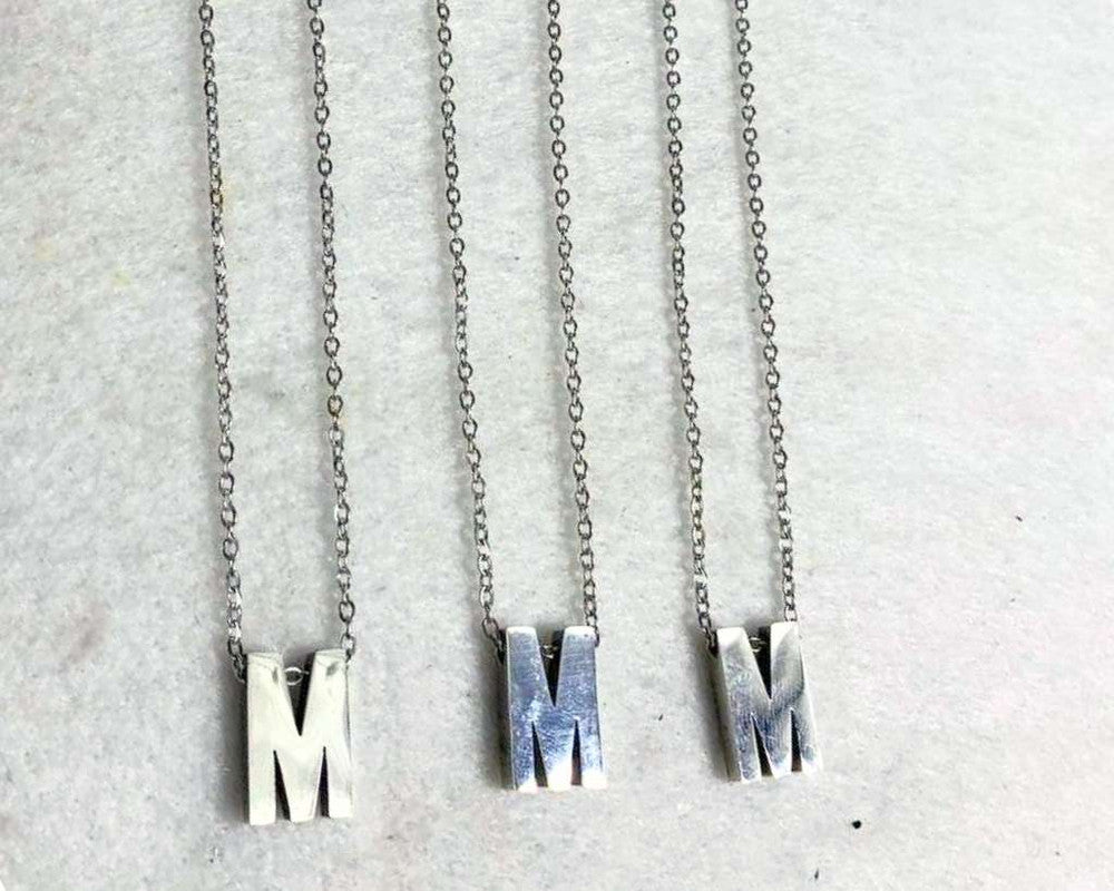 SILVER STAINLESS STEEL NECKLACE LETTER  M – Set of 12